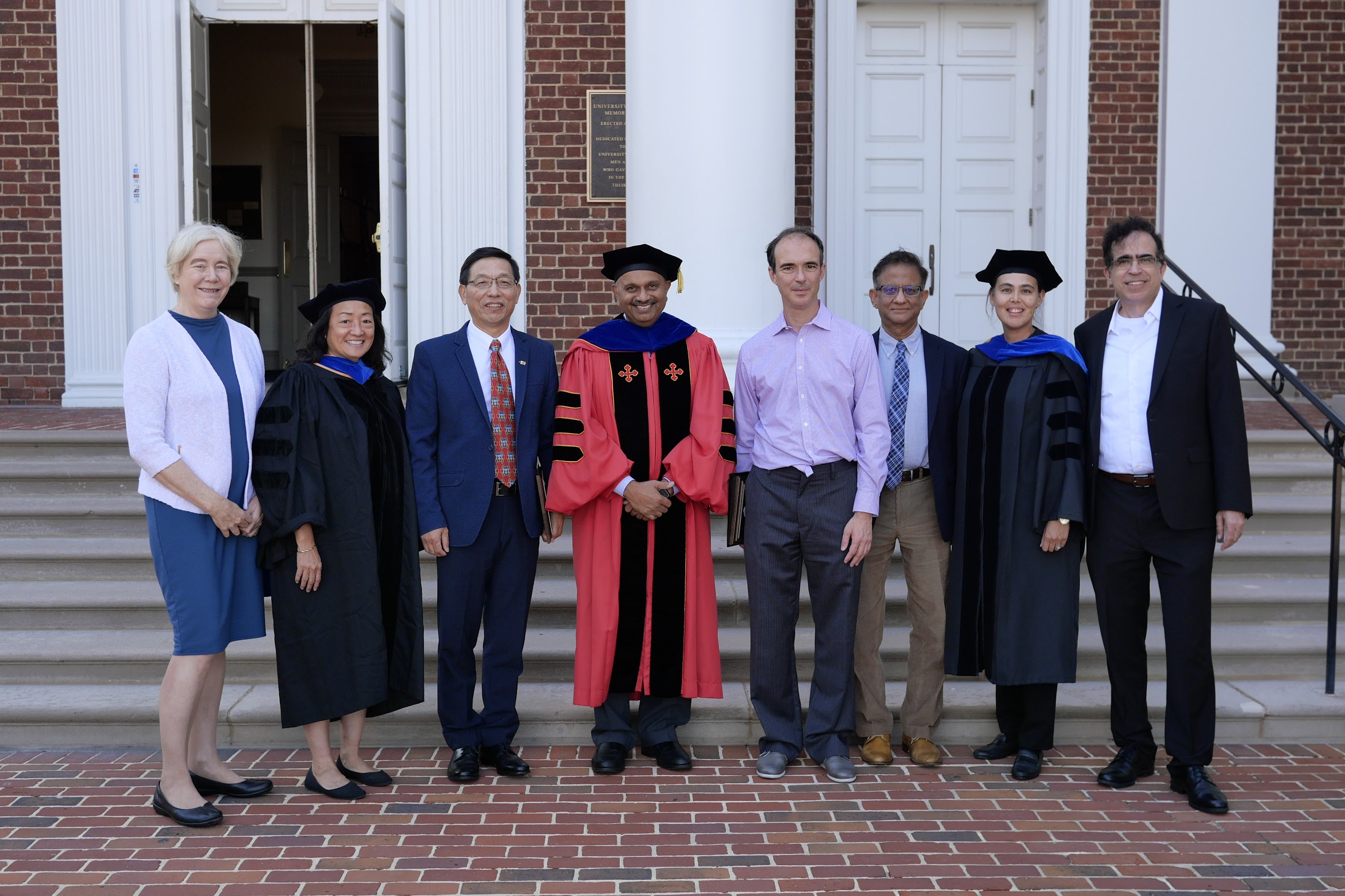 Zhanqing with a large group posing outside the memorial chapel