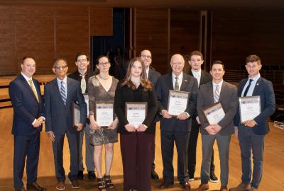 Mesonet team poses with their awards. 