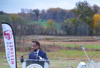 Sumant Nigam standing at podium for inauguration of the first Maryland Mesonet tower